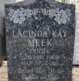 Blue Pearl granite single upright monument with a polished serpentine top. Blue Pearl granite single upright monument with a polished serpentine top.
