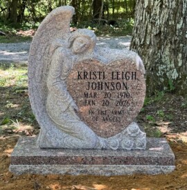 Queen Rose granite angel monument with single heart, black inscription, polished tablet and matching granite base. Queen Rose granite angel monument with single heart, black inscription, polished tablet and matching granite base.