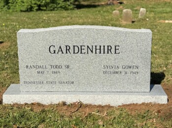 Georgia Grey granite companion upright monument with a serpentine top and matching base. Georgia Grey granite companion upright monument with a serpentine top and matching base.