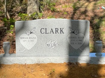 Georgia Grey companion headstone with matching base and two round vases. Georgia Grey companion headstone with matching base and two round vases.