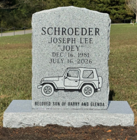 Georgia grey granite single upright headstone with a serpentine top and matching base. Georgia grey granite single upright headstone with a serpentine top and matching base.