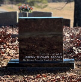 Jet Black granite single upright monument with a flat top. Jet Black granite single upright monument with a flat top.