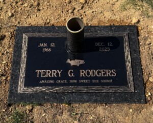 Bronze memorial featuring a simplicity design, mounted on a Mesabi Black Select granite base.